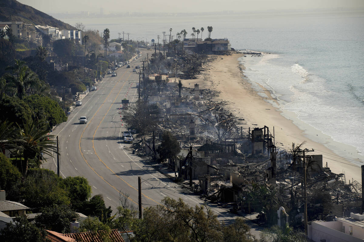 Beach front properties are left smoldering in the aftermath of the Palisades Fire Friday, Jan. ...