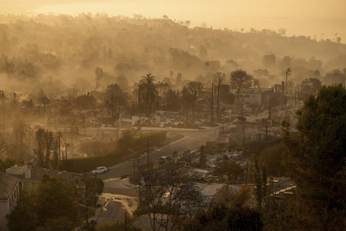 The devastation of the Palisades Fire is seen in the early morning in the Pacific Palisades nei ...