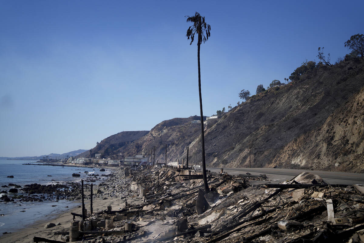 Beach front properties are damaged by the Palisades Fire Friday, Jan. 10, 2025 in Malibu, Calif ...