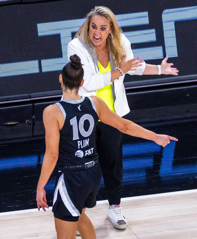 Aces head coach Becky Hammon yells at guard Kelsey Plum (10) as the game gets away against ...