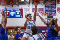 Centennial forward Nation Williams (24) elevates for a shot over Bishop Gorman center Aubrey Jo ...