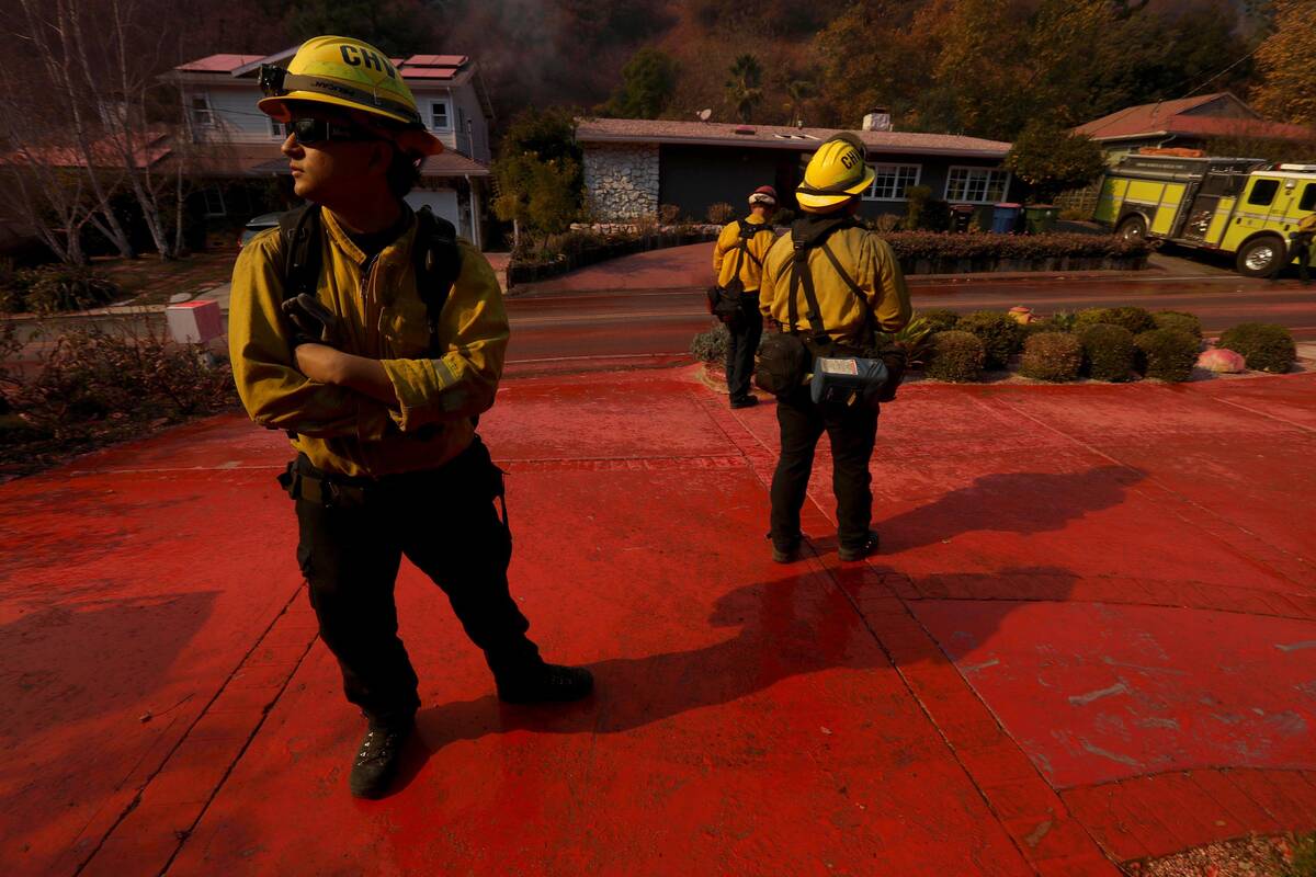 Chula Vista firefighters keep an eye on the Palisades fire after a phosphorus drop in Mandevill ...