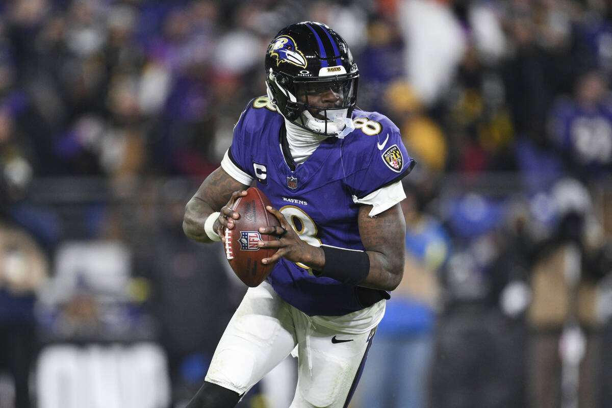 Baltimore Ravens quarterback Lamar Jackson (8) looks to pass the ball during the second half of ...