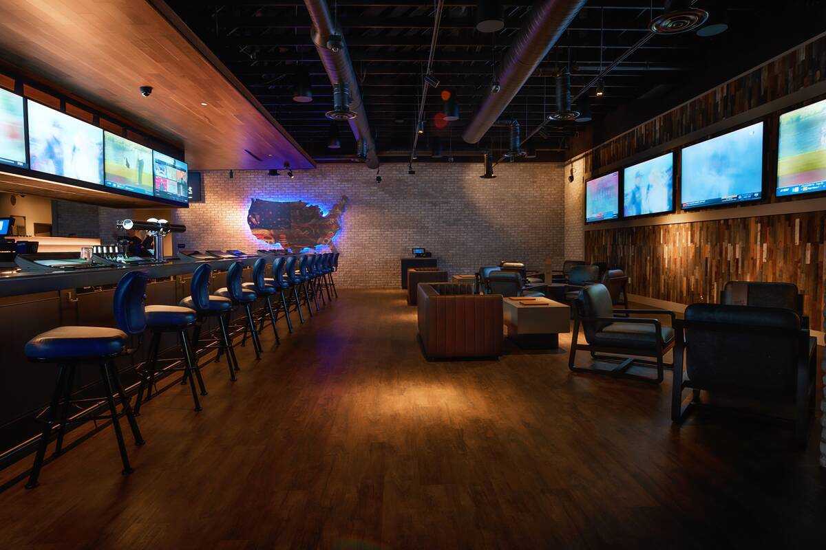 The interior of Seventy Six Tavern includes comfortable seating, big-screen televisions and a b ...