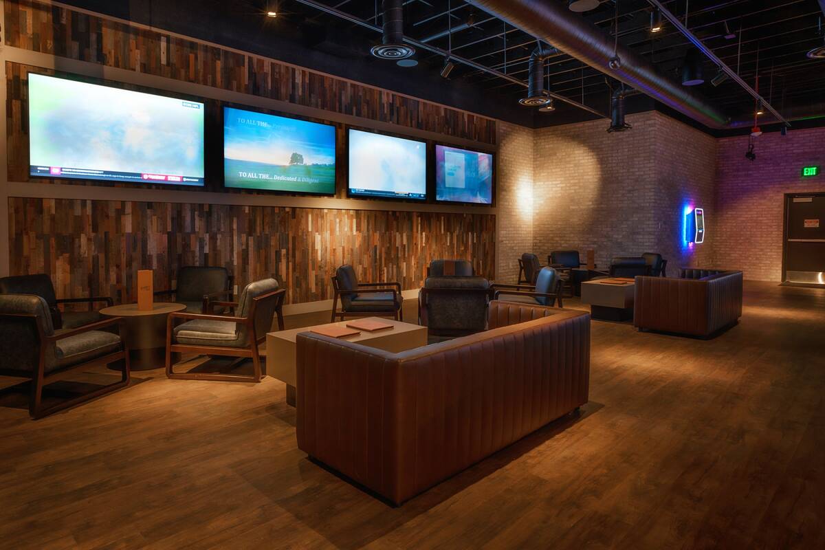 The interior of Seventy Six Tavern includes comfortable seating, big-screen televisions and a b ...