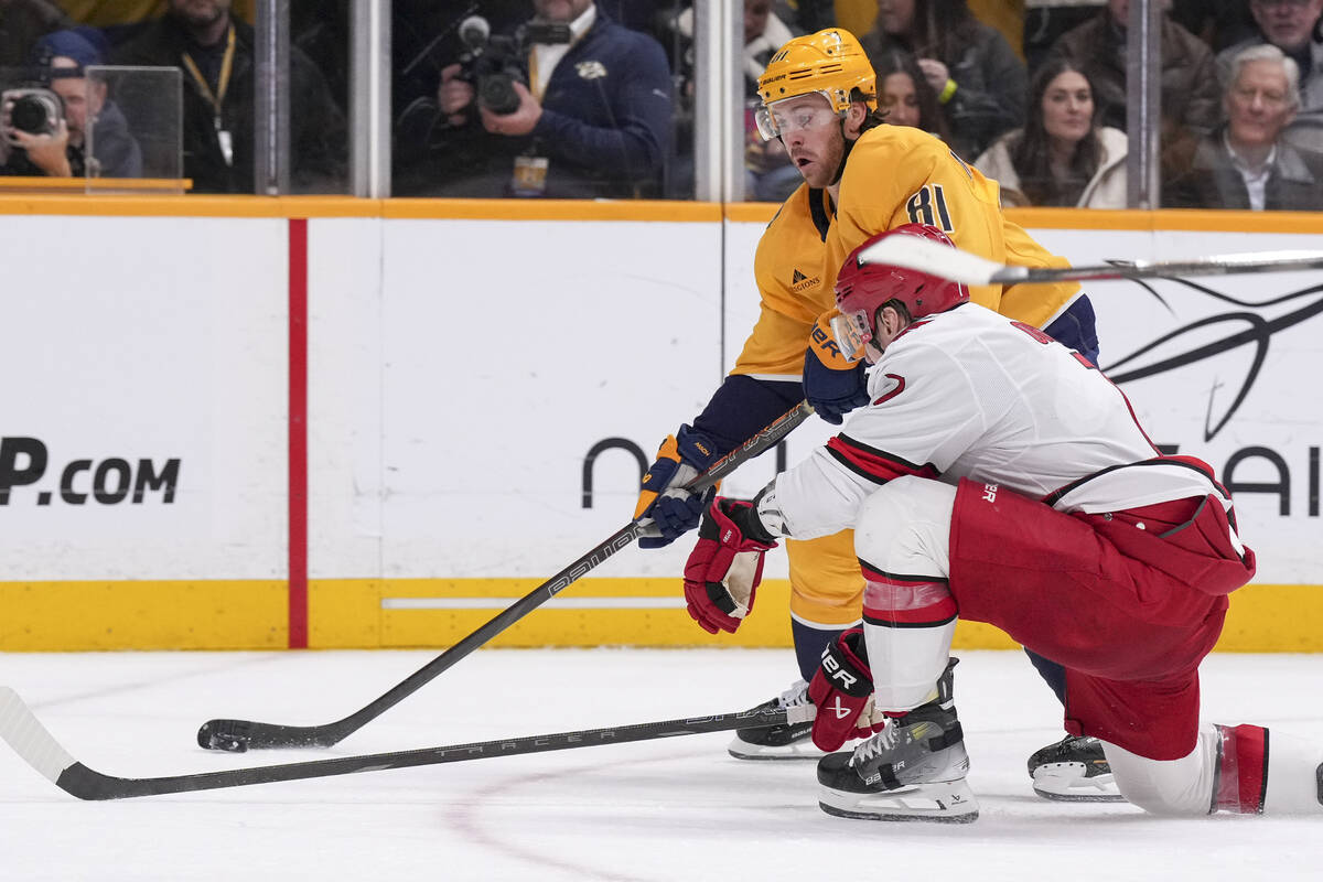 Nashville Predators center Jonathan Marchessault (81) skates the puck past Carolina Hurricanes ...