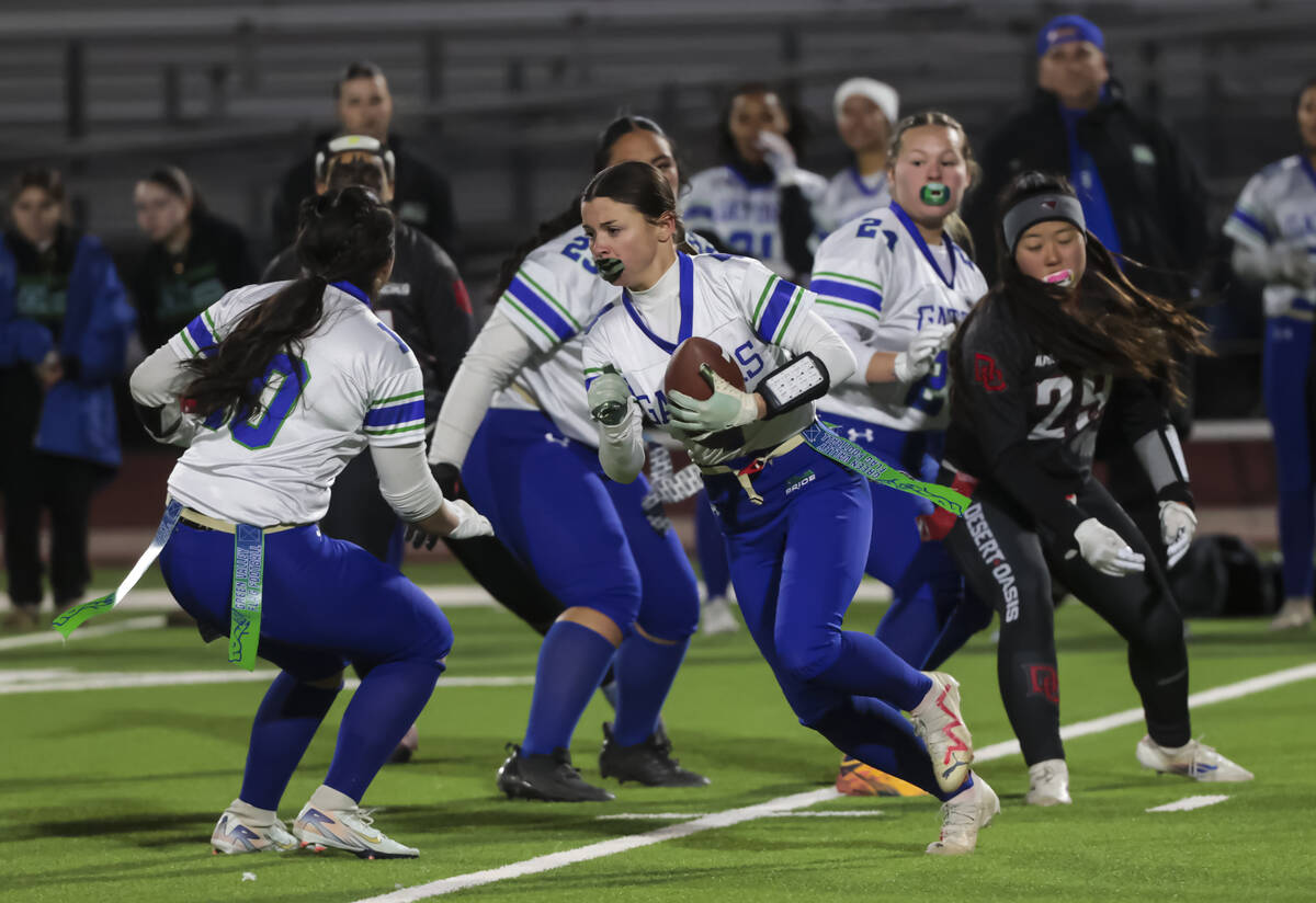 Green Valley's Lauryn Galvin (4) runs the ball during a flag football game at Desert Oasis High ...