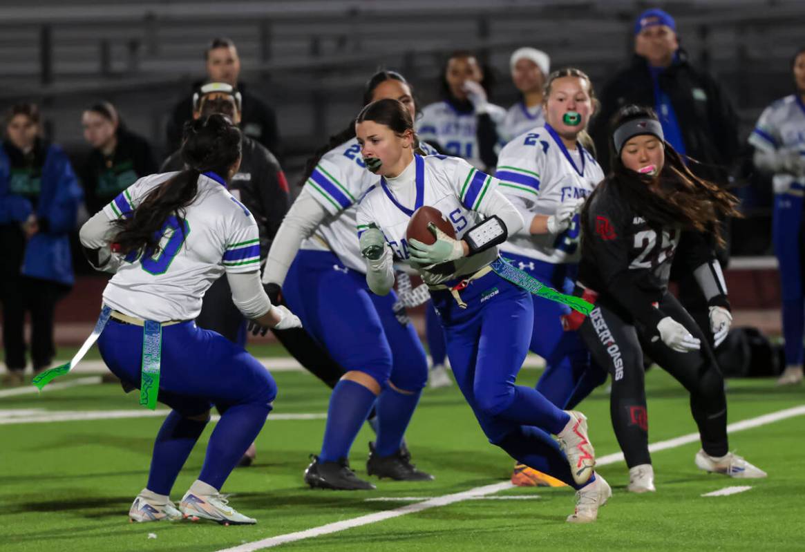 Green Valley's Lauryn Galvin (4) runs the ball during a flag football game at Desert Oasis High ...