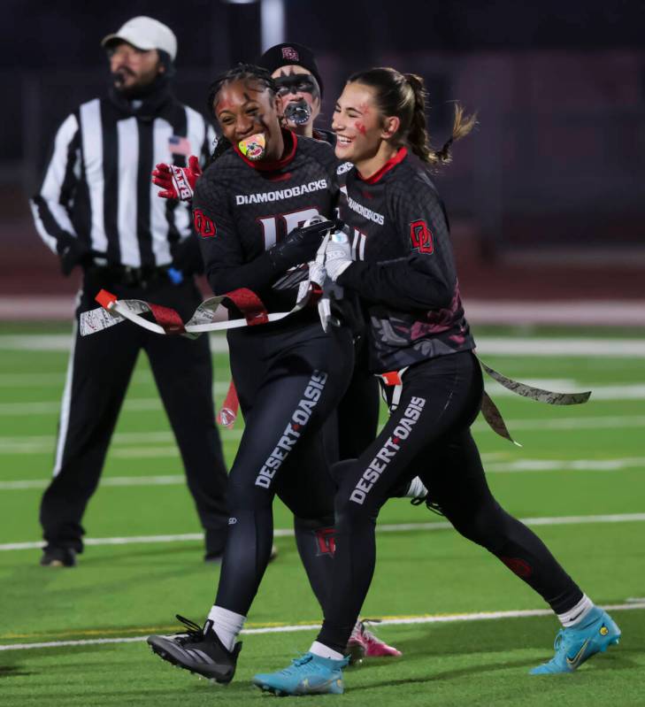 Desert Oasis' Anjali Spalding-Hyles (10) celebrates her interception against Green Valley with ...