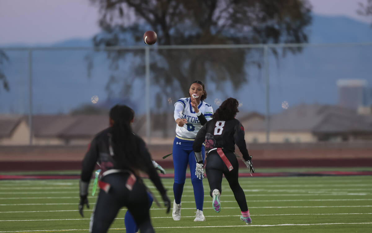 Green Valley quarterback Janae Peebles (0) throws a pass during a flag football game at Desert ...