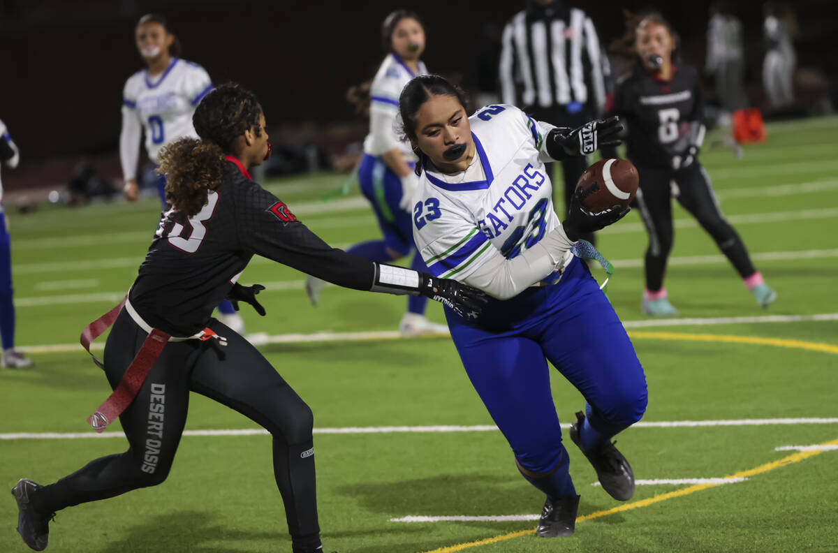 Green Valley's wide receiver Journey Tuitama (23) runs the ball during a flag football game at ...