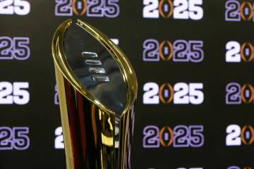 The National Championship Trophy is shown after a news conference at Mercedes-Benz Stadium on A ...