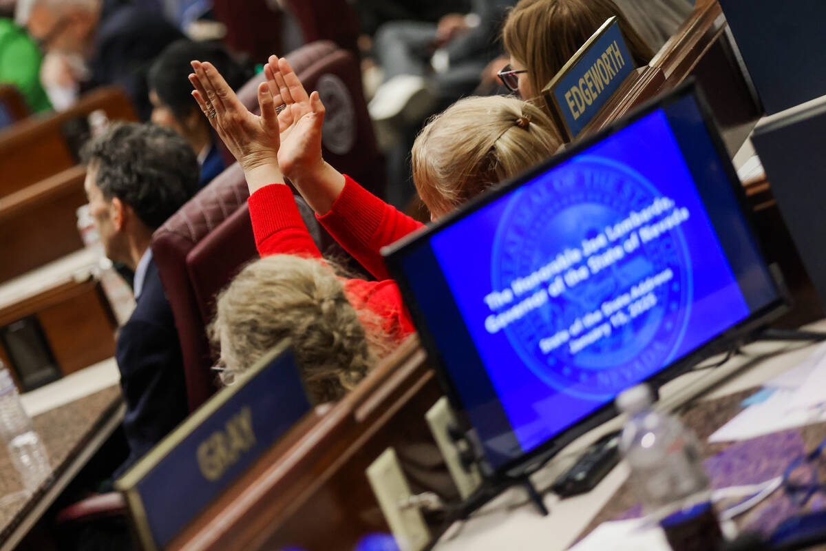 A person claps as Gov. Joe Lombardo speaks during his State of the State speech at the Legislat ...