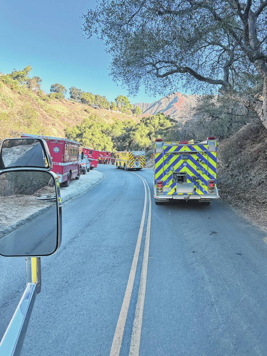 A Clark County strike team truck makes its way through the hills around Los Angeles this weeken ...