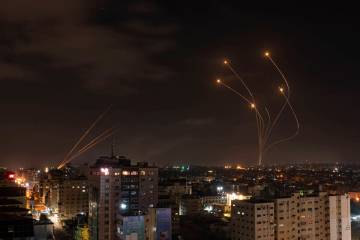 Rockets fired from Gaza and intercepted by Israel's Iron Dome anti-missile system over Israeli ...