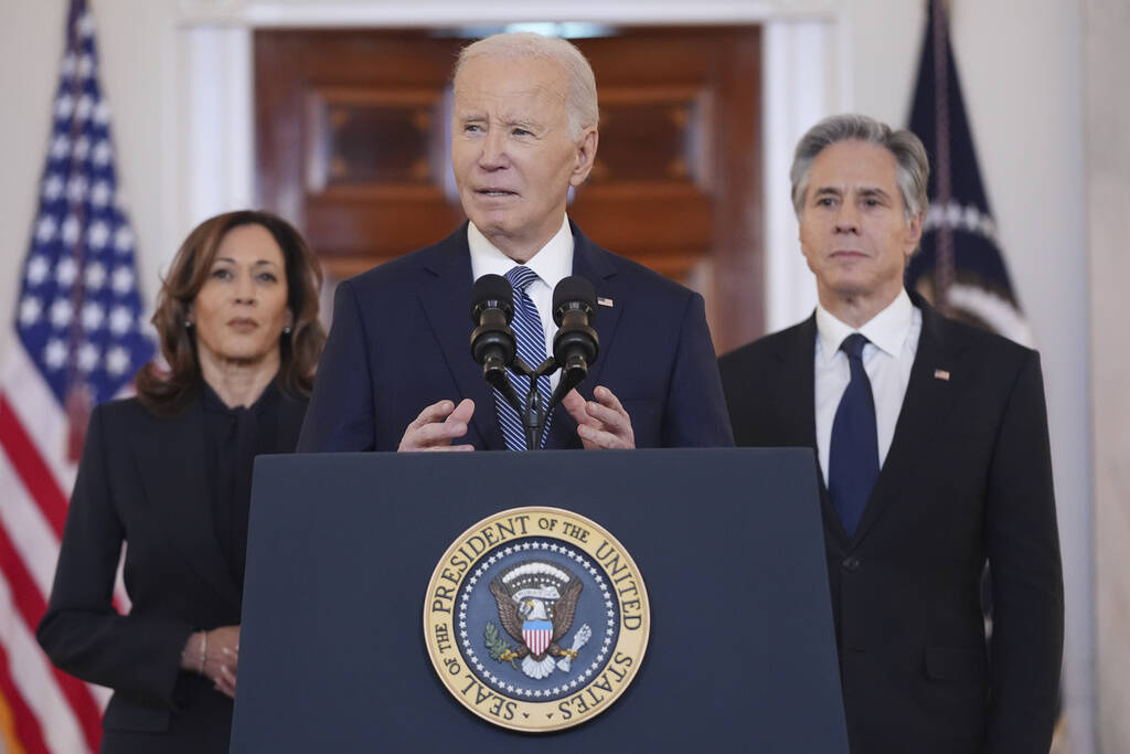 President Joe Biden, center, with Vice President Kamala Harris, left, and Sec. of State Anthony ...