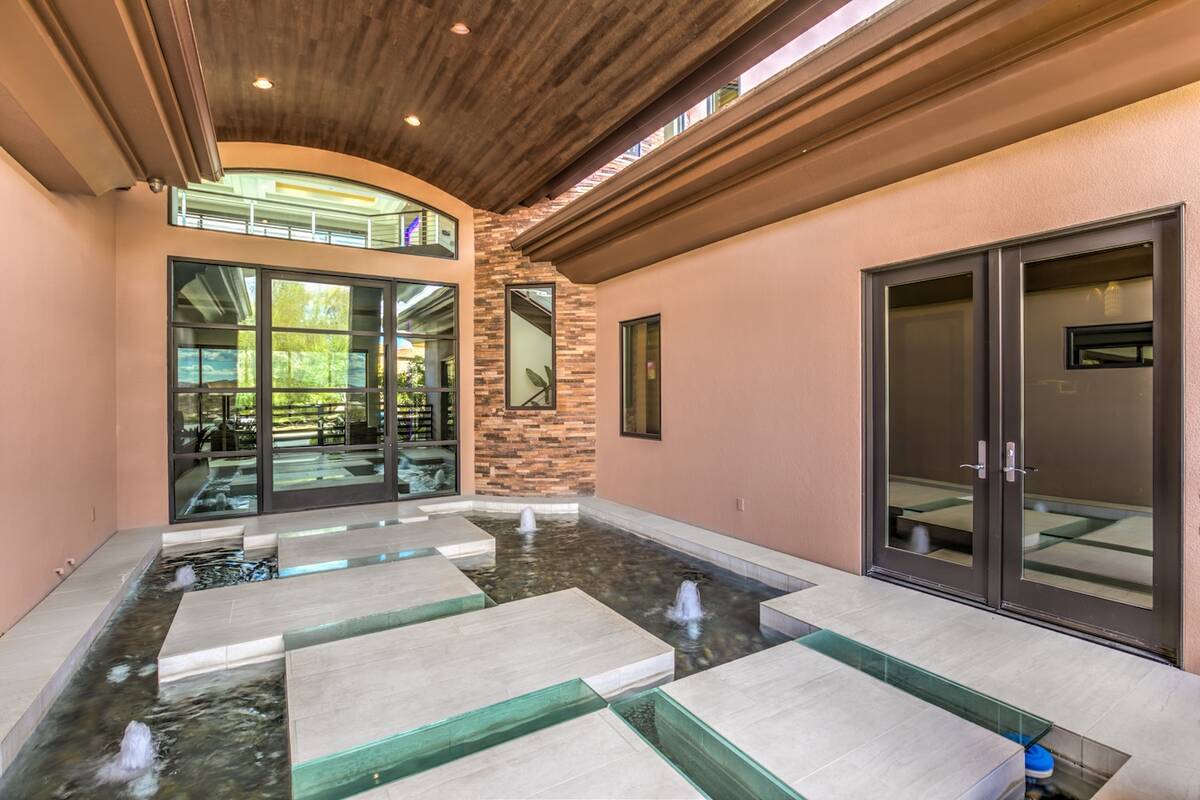 A water feature at the entrance. (Keller Williams Realty Southwest)