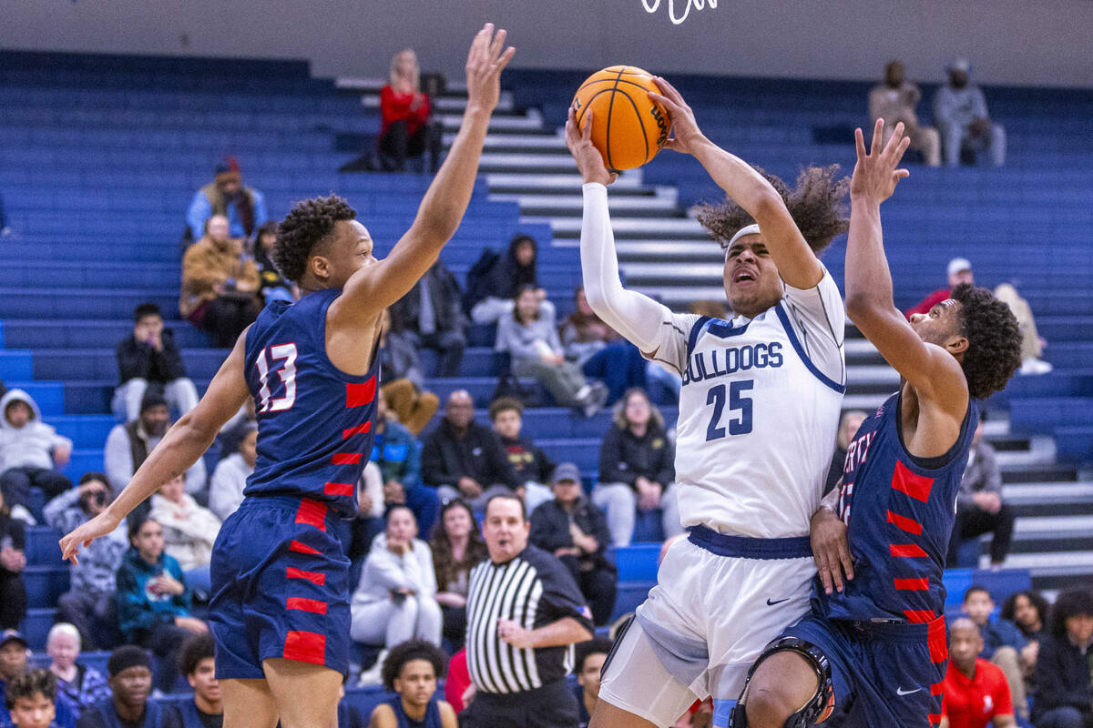 Centennial's Jayonni Durrough (25) elevates to shoot between Liberty's Jaden Riley (13) and Eva ...