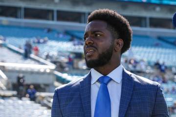 New York Giants assistant general manager Brandon Brown walks the sideline during warm-ups befo ...