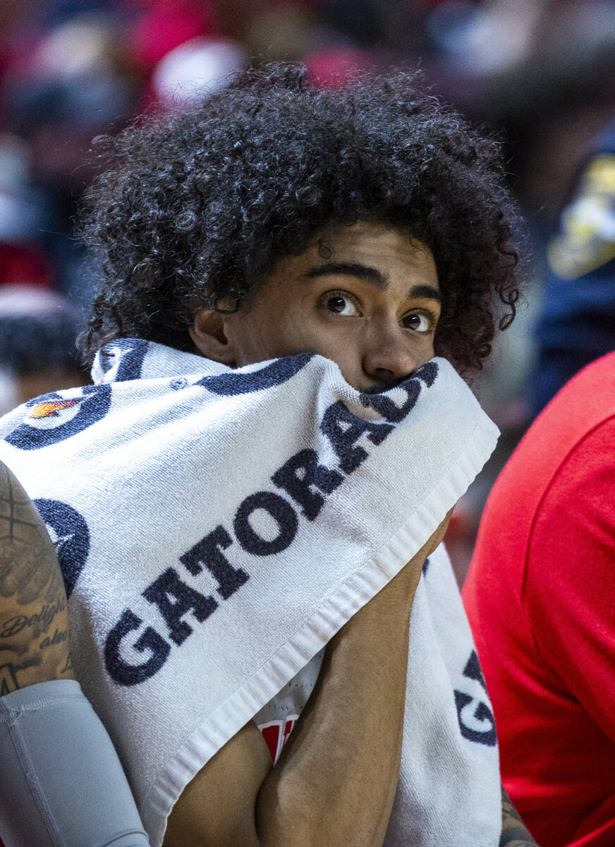 UNLV forward Jalen Hill (1) is concerned on the bench as the Utah State Aggies pull ahead durin ...