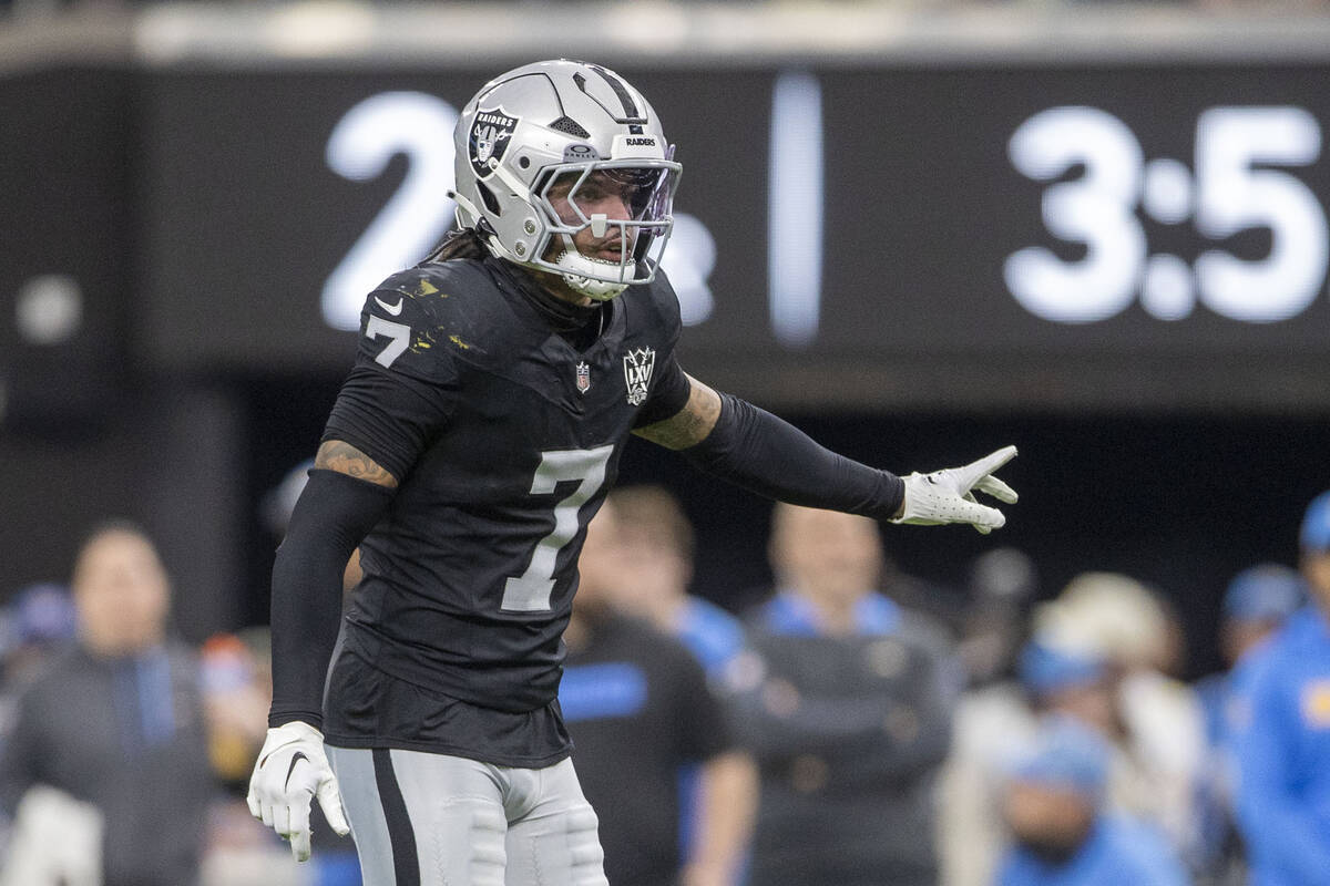 Raiders safety Tre'von Moehrig (7) signals to a teammate as he sets up during the first half of ...