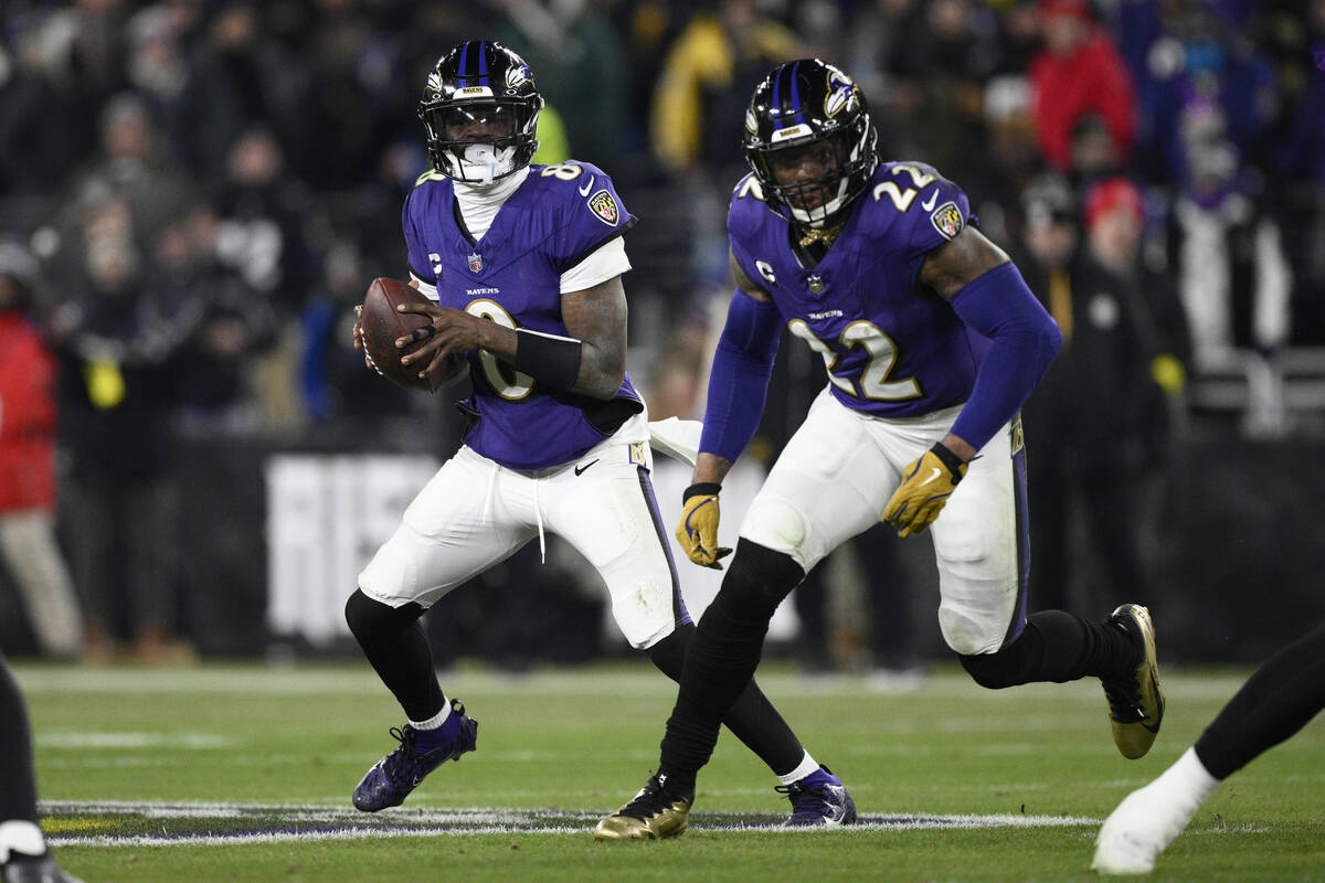 Baltimore Ravens quarterback Lamar Jackson (8) and running back Derrick Henry (22) in action du ...