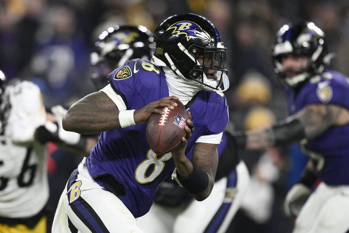 Baltimore Ravens quarterback Lamar Jackson (8) in action during the first half of an NFL footba ...