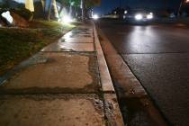 A sidewalk degraded by over-watering is seen on Mojave Road near Desert Inn Road Thursday, Janu ...