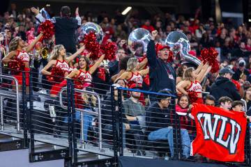 UNLV fans and the band celebrate another core against the San Diego State Aztecs during the fir ...