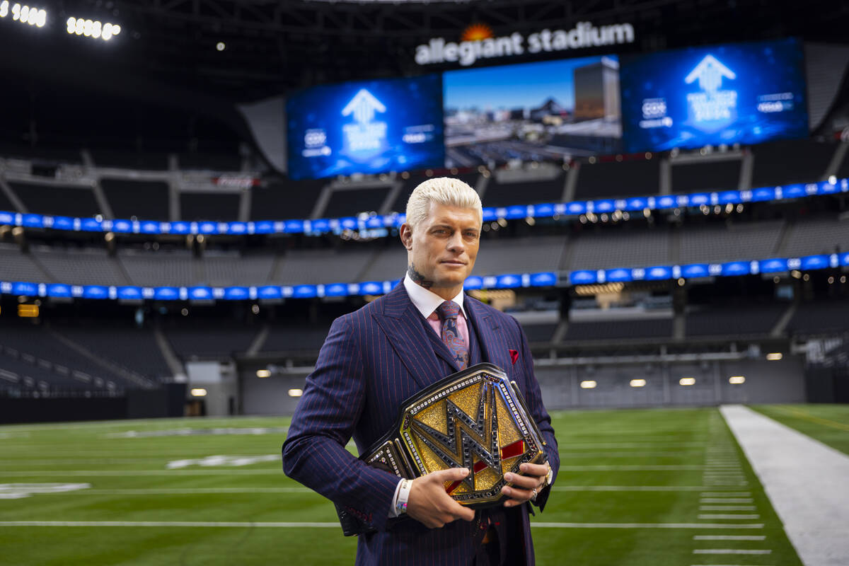 WWE superstar Cody Rhodes poses with the Undisputed WWE Championship belt at Allegiant Stadium ...