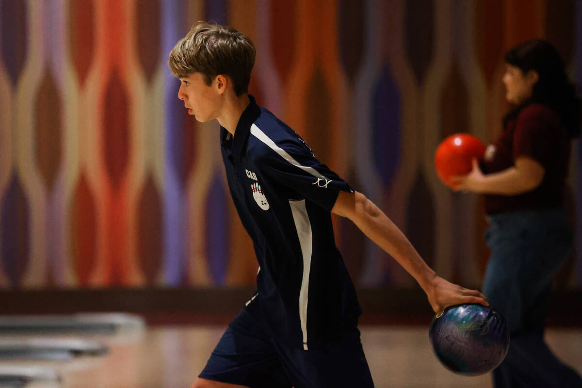 Joshua Jeeter of Coral Academy readies himself to launch the ball during a high school bowling ...