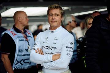 Actor Brad Pitt, acting in an upcoming Formula One-based movie, follows the second practice ses ...