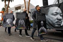 Resorts World employees march during the annual Martin Luther King Jr. Day parade on Monday, Ja ...