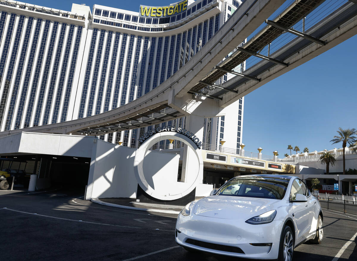 A Tesla with passengers leaves the Westgate's Vegas Loop station, an underground transportation ...