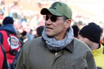 Former Washington Commanders head coach Ron Rivera looks on before an before an NCAA college fo ...