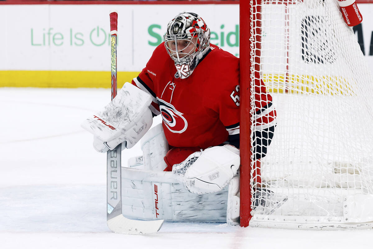 Carolina Hurricanes goaltender Pyotr Kochetkov (52) watches the puck against the Vegas Golden K ...