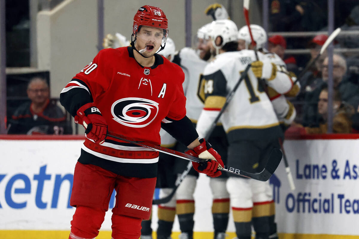 Carolina Hurricanes' Sebastian Aho (20) skates back to the bench as the Vegas Golden Knights ce ...