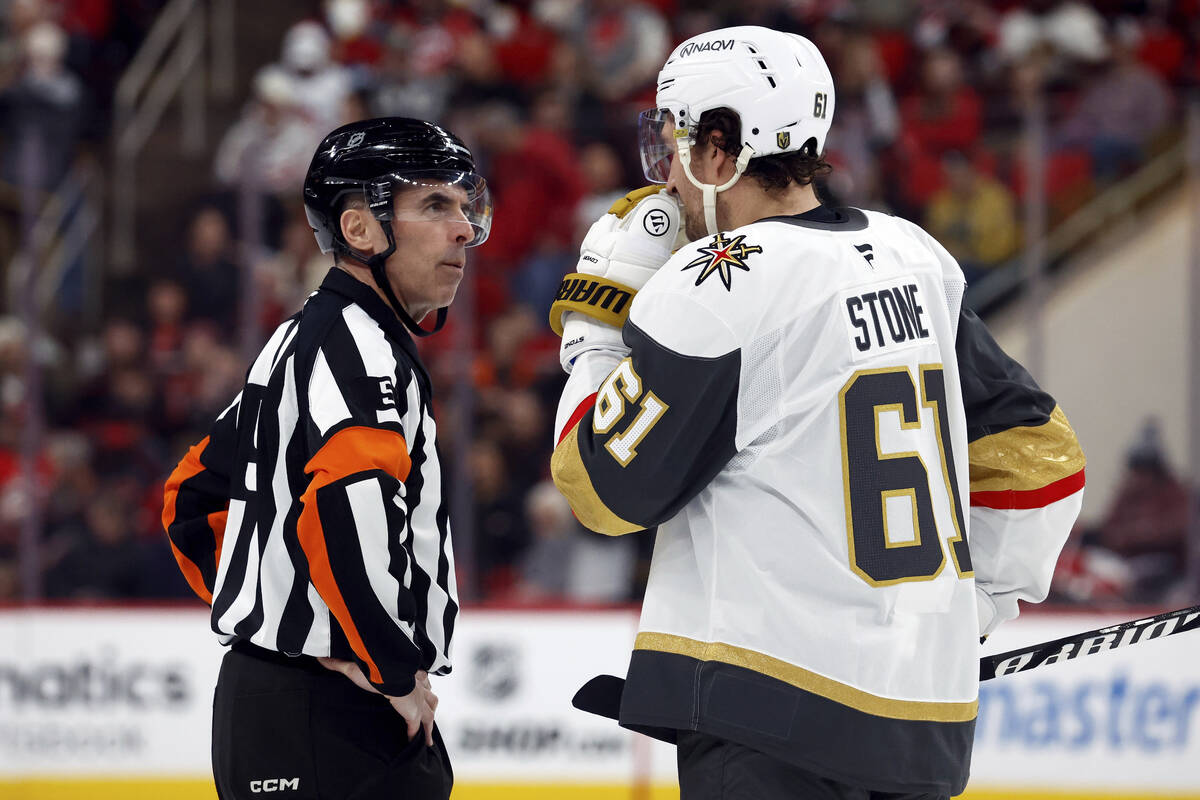 Vegas Golden Knights' Mark Stone (61) talks with an official during the second period of an NHL ...