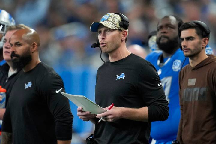 Detroit Lions offensive coordinator Ben Johnson watches during an NFL football game against the ...