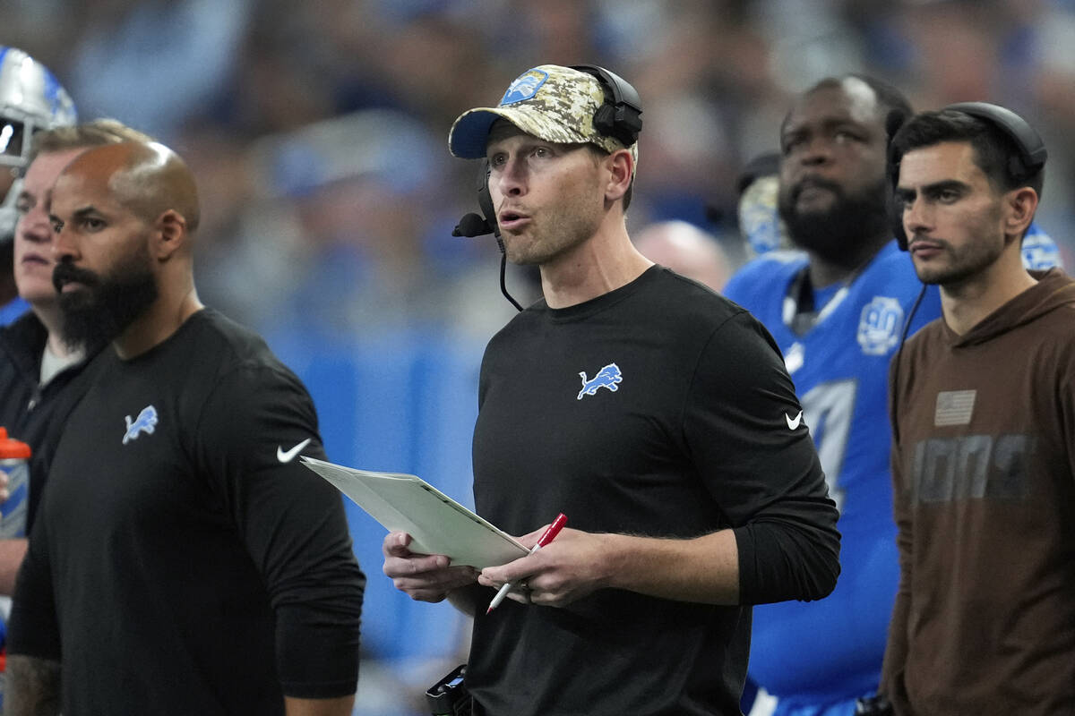 Detroit Lions offensive coordinator Ben Johnson watches during an NFL football game against the ...