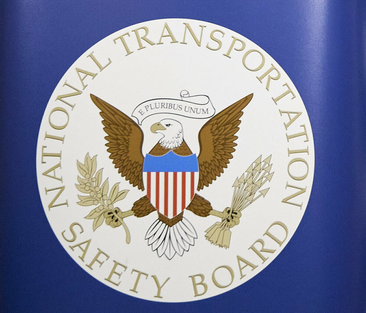 The National Transportation Safety Board logo is seen during a news conference in Portland, Ore ...