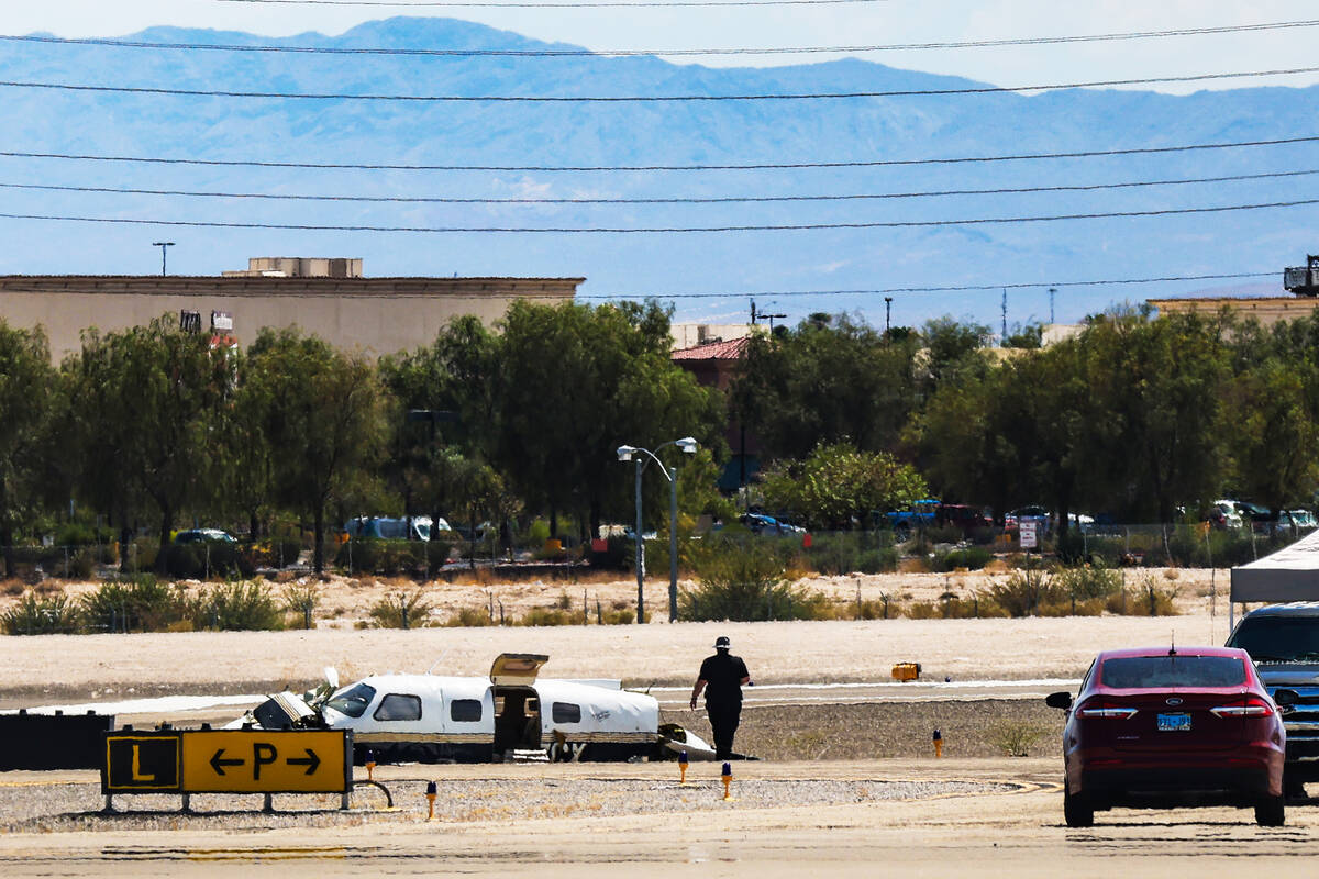 The scene of a plane crash at North Las Vegas Airport in North Las Vegas, Sunday, July 17, 2022 ...