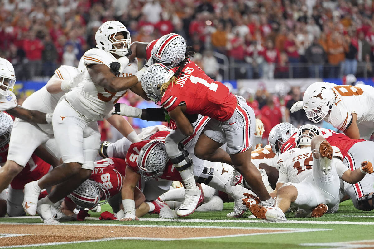 Ohio State running back Quinshon Judkins (1) runs for a touchdown against Texas during the seco ...