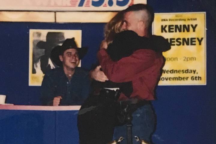 Dean and Lori Mattoon hug after Dean's proposal at Texas Station on Nov. 9, 1996. Budding count ...