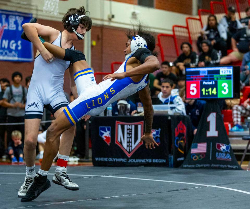 SLAM's Eric Bice takes down Sierra Vista's Makhi Clark iduring their 106 lb. finals match in th ...