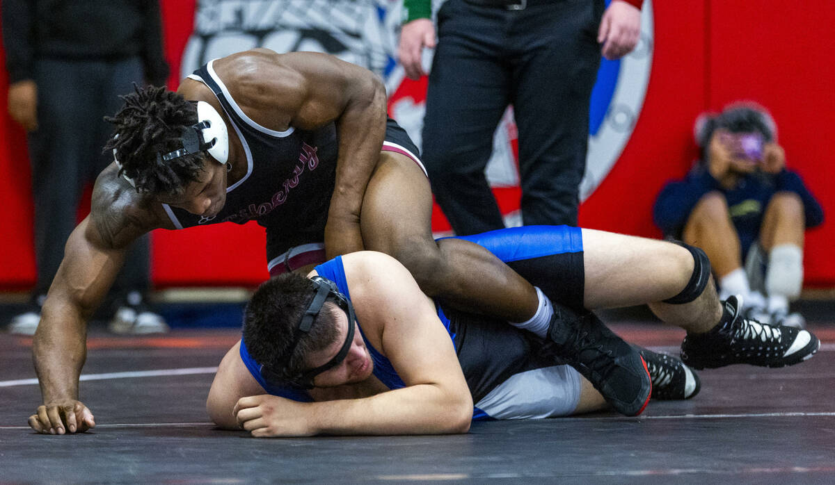 Liberty's Melvin Whitehead gets control of Desert Pines' Manuel Salazar during their 215 lb. fi ...