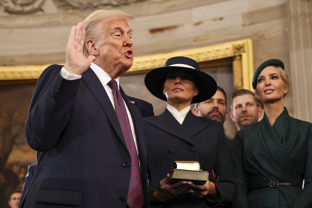 President-elect Donald Trump takes the oath of office as he is sworn in as president during the ...