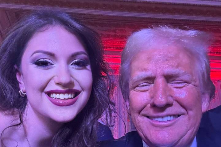 Angelina Alexon is shown with Donald Trump at Mar-A-Lago on Dec. 31, 2025. (Angelina Alexon)