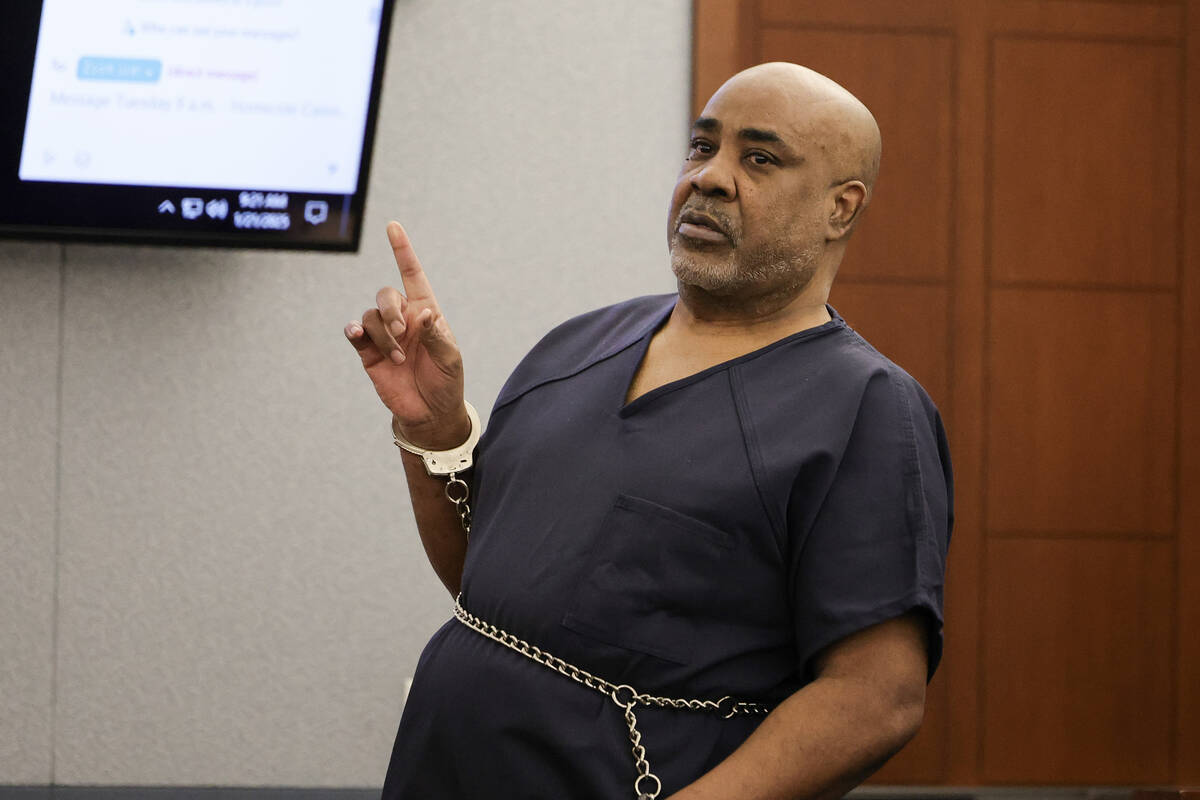 Duane Davis gestures toward the judge in Clark County District Court during a hearing on a moti ...