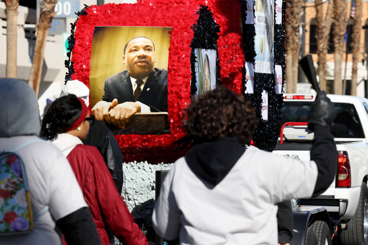 Participants with Victory Missionary Baptist Church march in the 43rd annual Martin Luther King ...